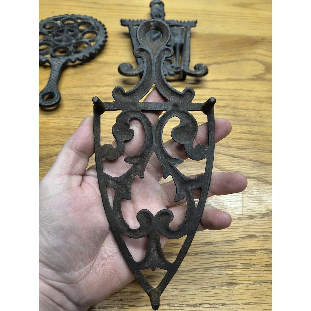 Vintage Black Cast Iron Trivets (set of 3)‎